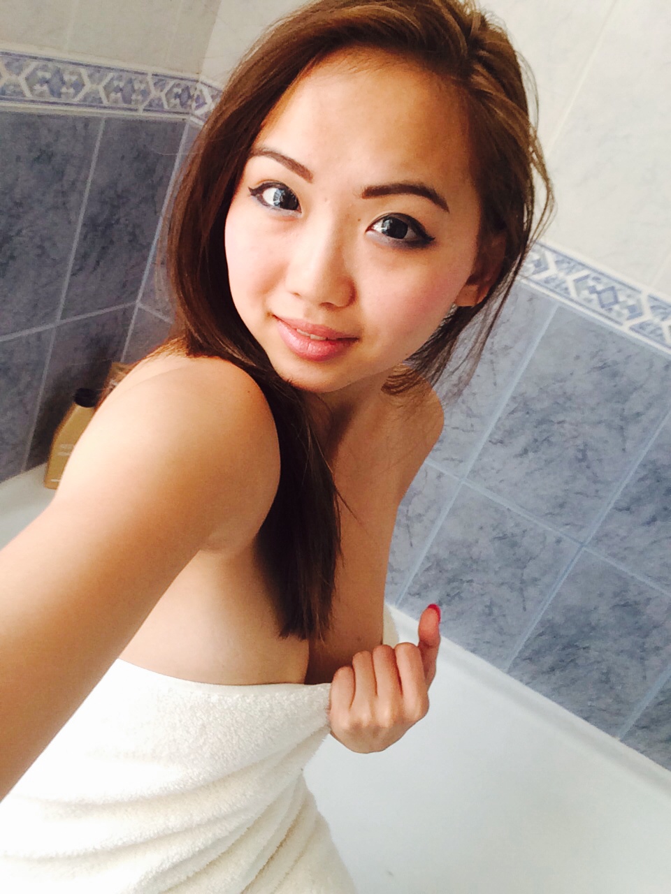 Asian girl taking shower