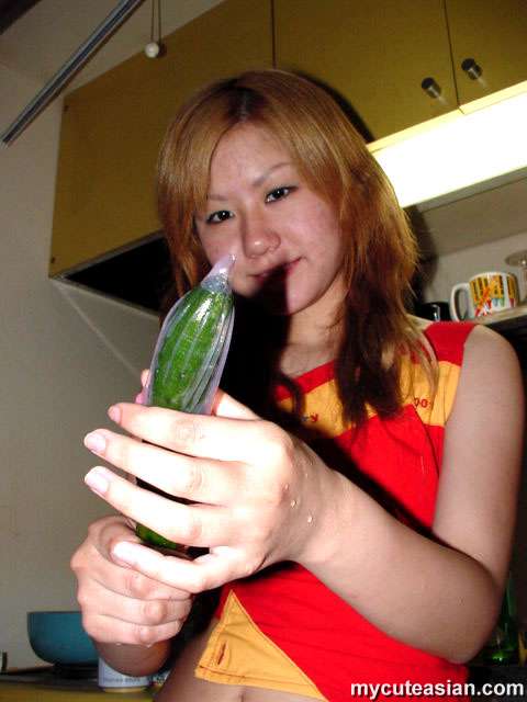 Petunia reccomend Asian girl with cucumber in her pussy